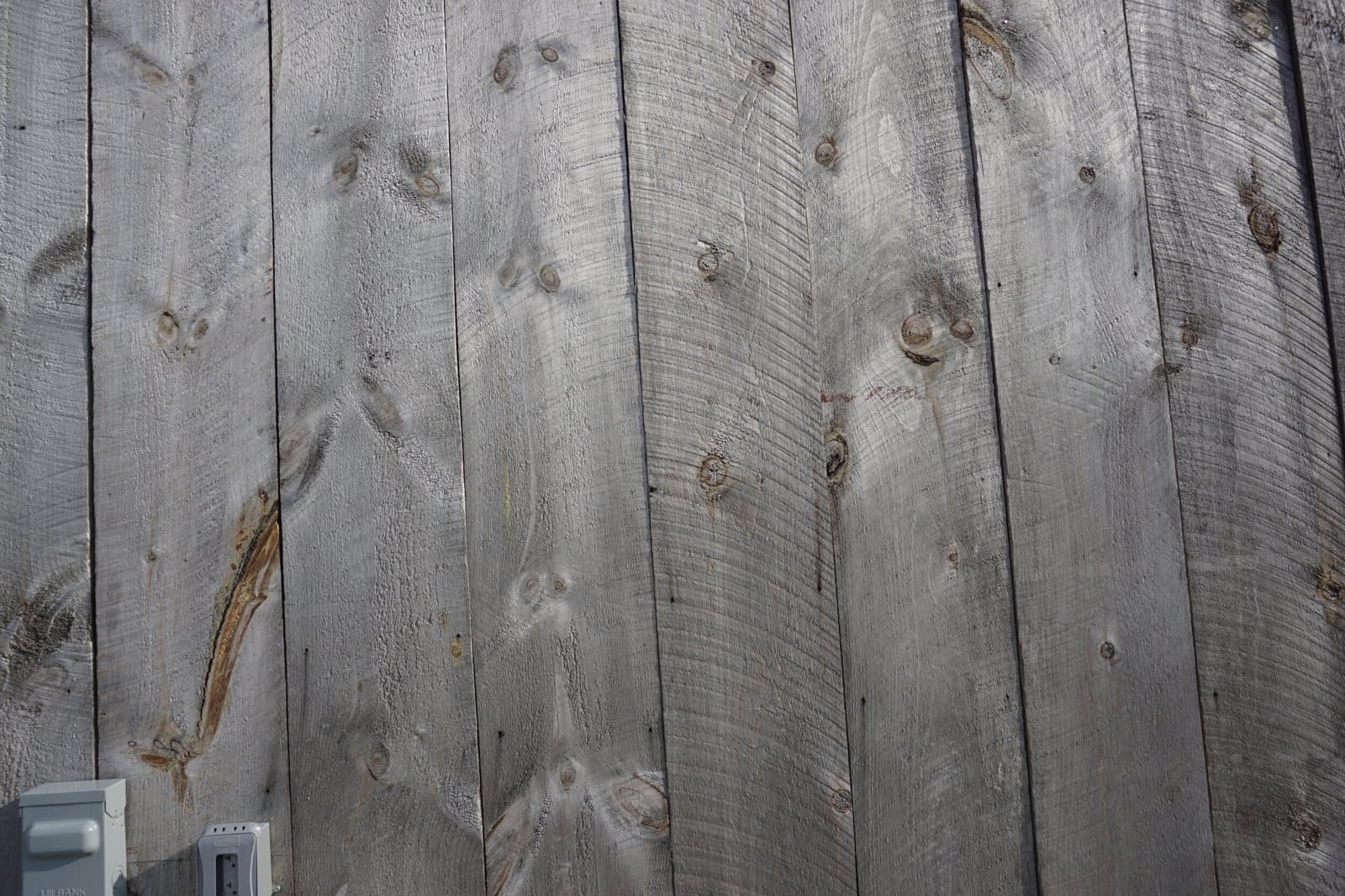 Weathered gray reclaimed barn board, surface detail